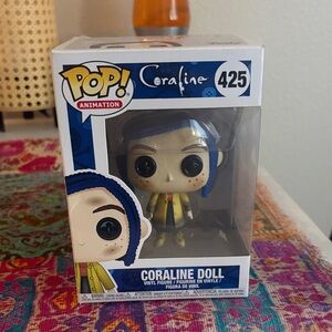 Funko Coraline Doll in Yellow and Blue
